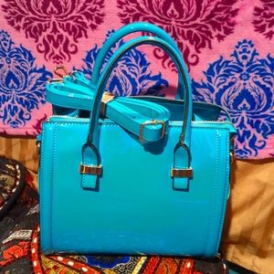 Turquoise faux leather handbag